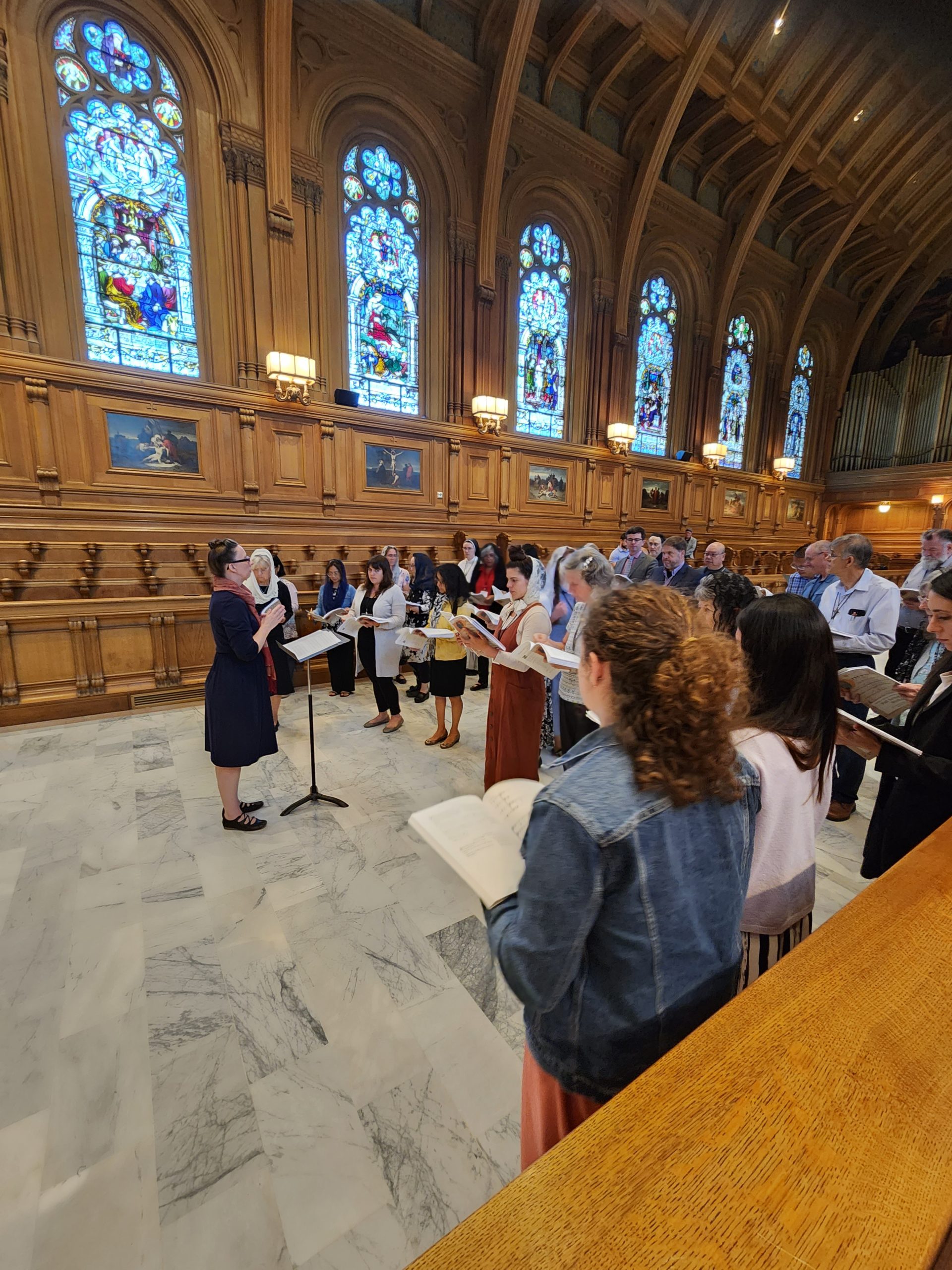 Jennifer Donaldson Conducts Schola learn sacred music fall workshop Church Music Association of America